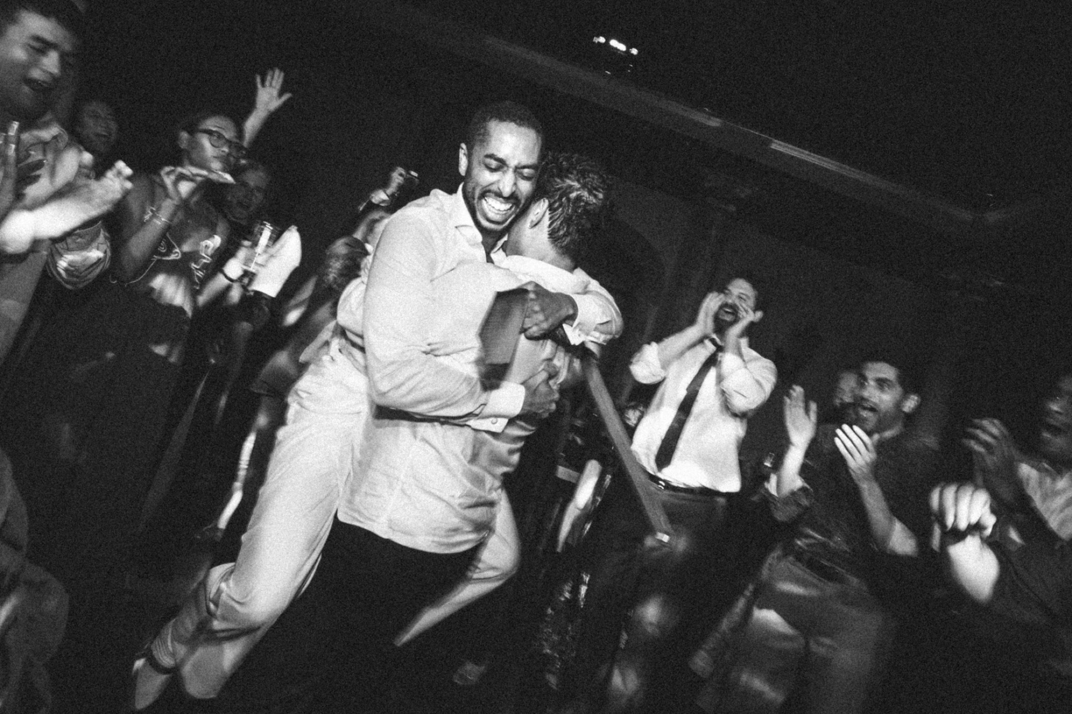 Wedding guests reacting to the music